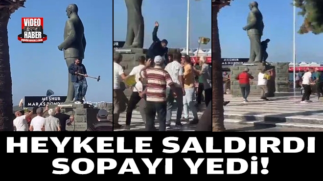 Atatürk heykeline saldırdı, sopayı yedi!