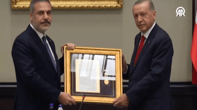 Erdoğan dan Hakan Fidan a  üstün hizmet madalyası 