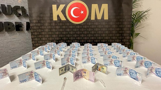 İzmir deki sahte para operasyonunda 2 kişi yakalandı