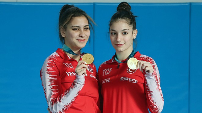 Milli cimnastikçi Sıla ve Elçin, altın madalyanın gururunu yaşıyor