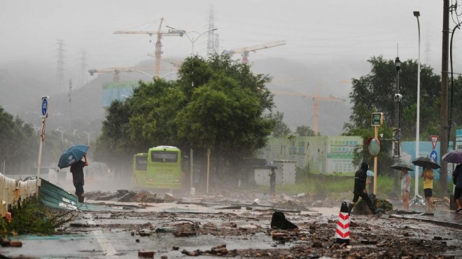 Pekin de şiddetli yağışlar 11 can aldı