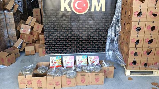 Yardım kolilerinden inşaat kumu çıktı!